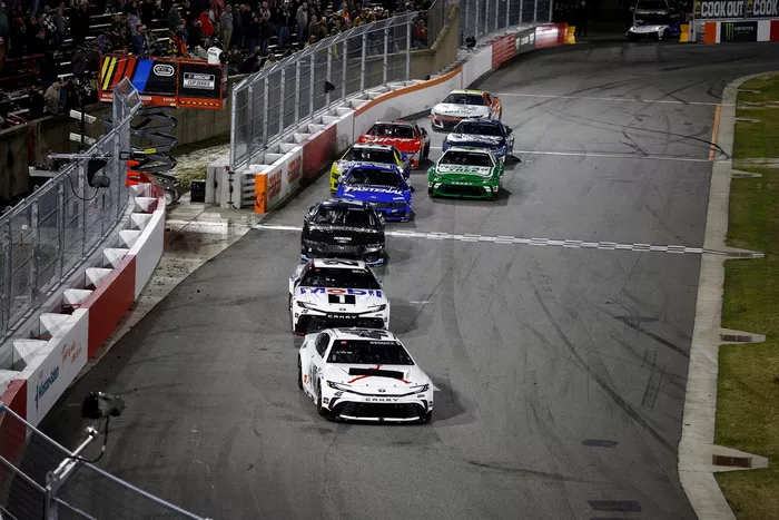 Tyler Reddick, 23XI Racing Toyota, Christopher Bell, Joe Gibbs Racing Toyota