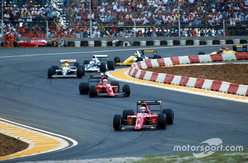 Winner Alain Prost, Ferrari 641 leads Nigel Mansell, Ferrari 641 and Riccardo Patrese, Williams Renault FW13B