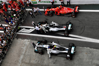 Valtteri Bottas, Mercedes AMG F1, Lewis Hamilton, Mercedes AMG F1 and Sebastian Vettel, Ferrari in parc ferme
