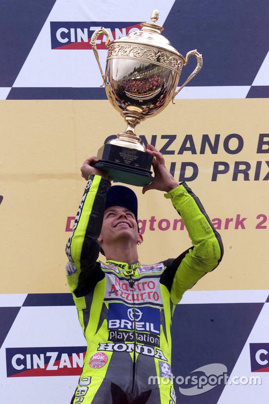 Podio: ganador de la carrera Valentino Rossi, Honda