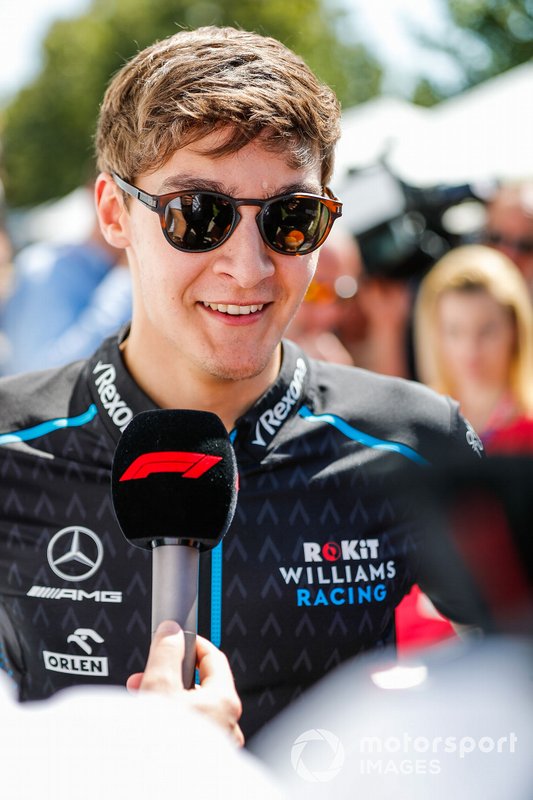 George Russell, Williams Racing, talks to the press