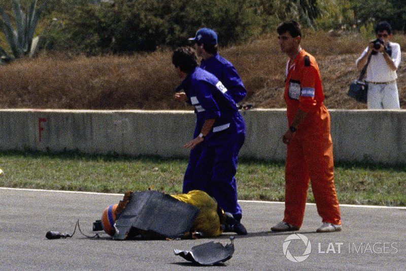 Martin Donnelly, Team Lotus, lies on the track after a horrific crash