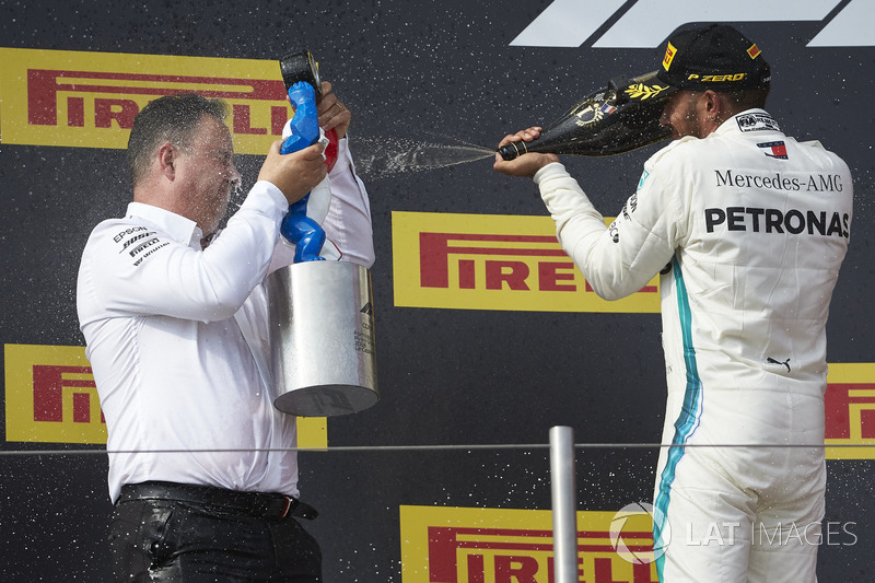 Lewis Hamilton, Mercedes AMG F1, 1st position, sprays Champagne at Ron Meadows, Sporting Director, Mercedes AMG, on the podium