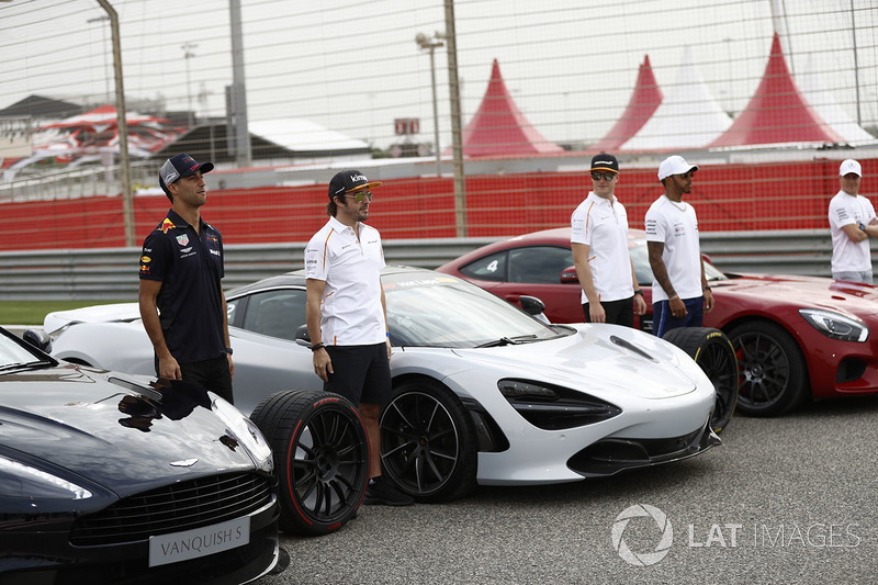 Daniel Ricciardo, Red Bull Racing, with the Aston Martin Vanquish S. Fernando Alonso, McLaren, and Stoffel Vandoorne, McLaren, with the McLaren 720s. Lewis Hamilton, Mercedes AMG F1, and Valtteri Bottas, Mercedes AMG F1, with the Mercedes AMG GTR, on grid for the Pirelli Hot Laps