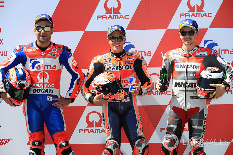 Tiga besar start: 1. Marc Marquez, 2. Danilo Petrucci, 3. Jorge Lorenzo