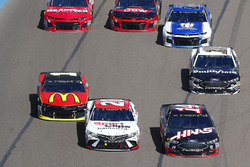 Clint Bowyer, Stewart-Haas Racing, Ford Fusion Haas Automation and Erik Jones, Joe Gibbs Racing, Toyota Camry Sport Clips