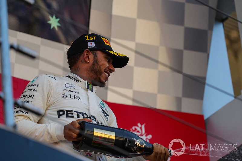Lewis Hamilton, Mercedes AMG F1 celebrates on the podium with the champagne