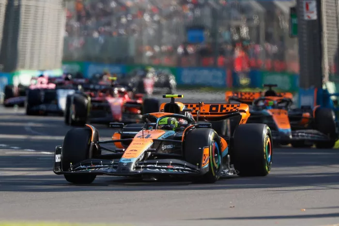 Lando Norris, McLaren MCL60, Oscar Piastri, McLaren MCL60, Carlos Sainz, Ferrari SF-23