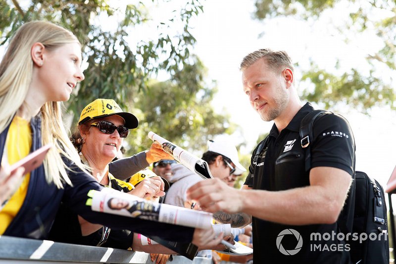 Kevin Magnussen, Haas F1 Team, signs autographs for fans