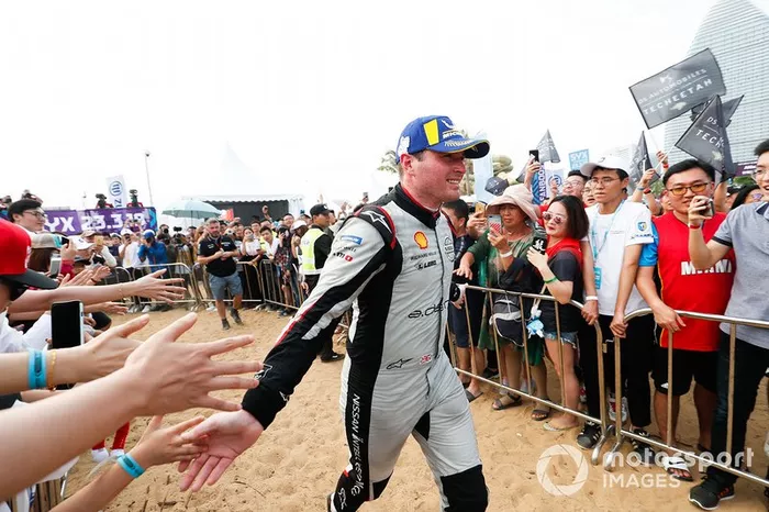 Oliver Rowland, Nissan e.Dams, makes his way to the podium