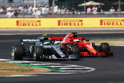 Valtteri Bottas, Mercedes AMG F1 W09, leads Sebastian Vettel, Ferrari SF71H