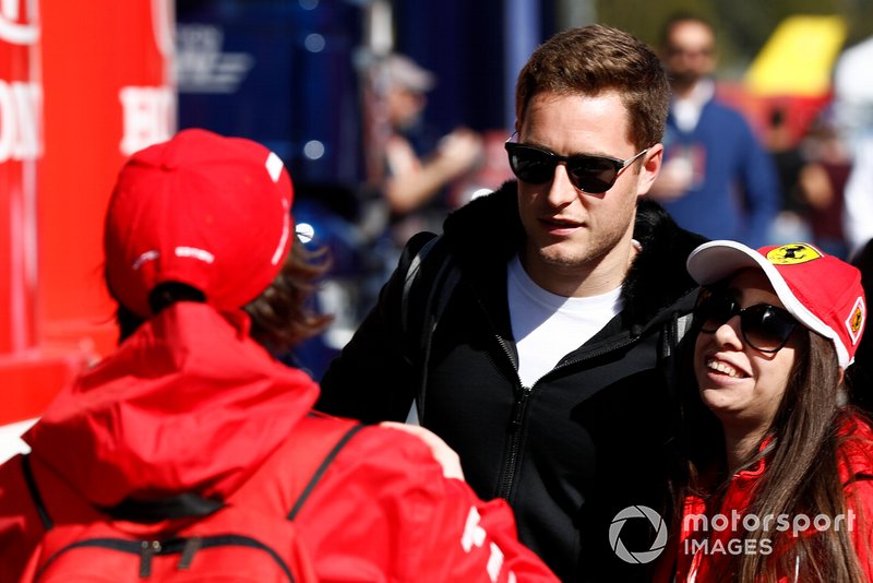Stoffel Vandoorne poses for a photo with a fan