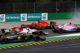 Sebastian Vettel, Ferrari SF71H spins after contact with Lewis Hamilton, Mercedes AMG F1 W09 on lap one as Max Verstappen, Red Bull Racing RB14 passes
