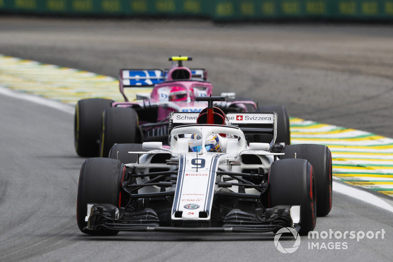 Marcus Ericsson, Sauber C37, leads Esteban Ocon, Racing Point Force India VJM11