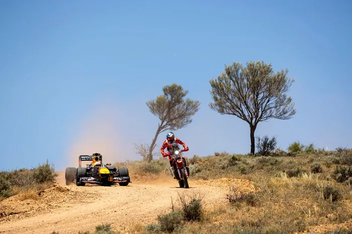 Daniel Ricciardo, Red Bull Racing  RB7 with Daniel Sanders