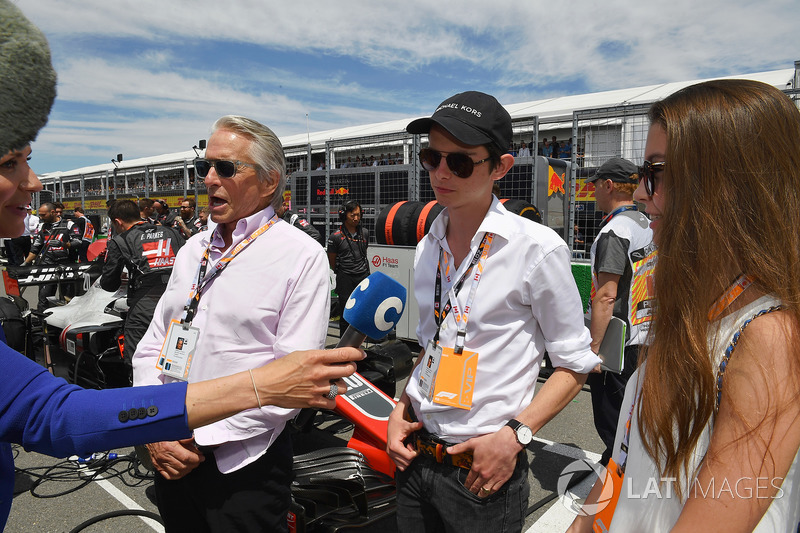 Michael Douglas, with his son Dylan Douglas, and daughter Carys Zeta-Douglas, on the grid