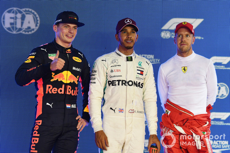 (L to R): Max Verstappen, Red Bull Racing, Lewis Hamilton, Mercedes AMG F1 and Sebastian Vettel, Ferrari celebrate in parc ferme