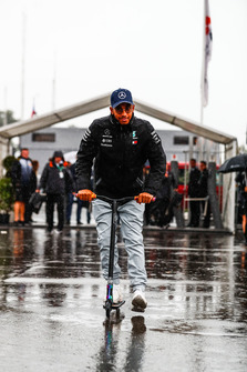 Lewis Hamilton, Mercedes AMG F1, arrives in the paddock