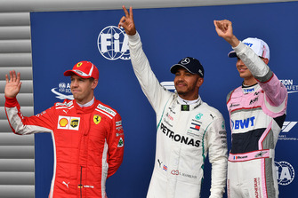 (L to R): Sebastian Vettel, Ferrari, Lewis Hamilton, Mercedes AMG F1 and Esteban Ocon, Racing Point Force India F1 Team celebrate in parc ferme