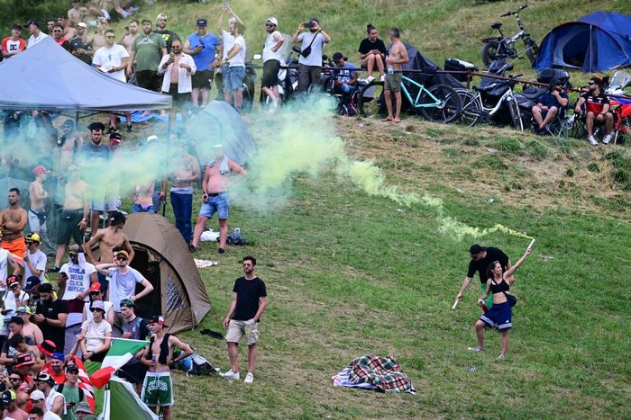 Spectators attend the Italian Moto GP Grand Prix