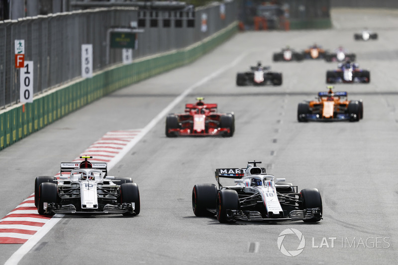 Lance Stroll, Williams FW41 Mercedes, Charles Leclerc, Sauber C37 Ferrari, Kimi Raikkonen, Ferrari SF71H y Stoffel Vandoorne, McLaren MCL33 Renault