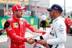 Sebastian Vettel, Ferrari, congratulates Lewis Hamilton, Mercedes AMG F1, after qualifying