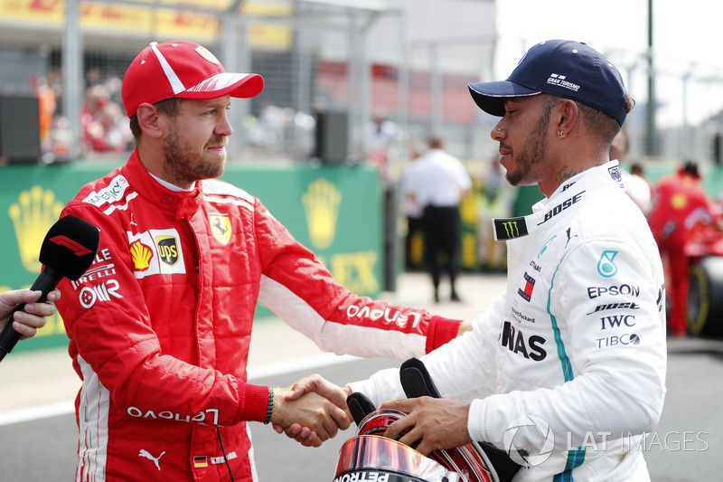 Себастьян Феттель, Ferrari, и Льюис Хэмилтон, Mercedes AMG F1