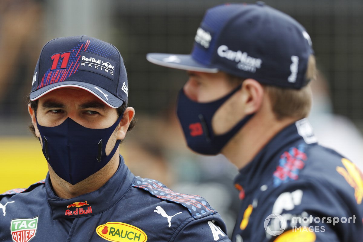 Sergio Perez, Red Bull Racing, and Max Verstappen, Red Bull Racing, on the grid, ahead of the 2022 Formula 1 car unveiling