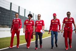 Sebastian Vettel, Ferrari, Antonio Giovinazzi, Ferrari and Riccardo Adami, Ferrari Race Engineer walk the track