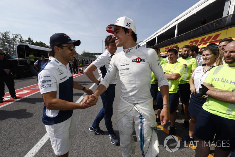 Felipe Massa, Williams, congratulates Lance Stroll, Williams, on his first points