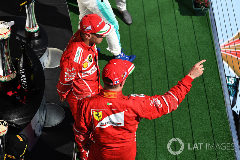 Подіум: переможець Себастьян Феттель, Кімі Райкконен, Ferrari