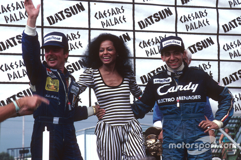 Podio: el ganador Michele Alboreto, Tyrell Ford, y el segundo clasificado y Campeón del Mundo Keke Rosberg, Williams Ford