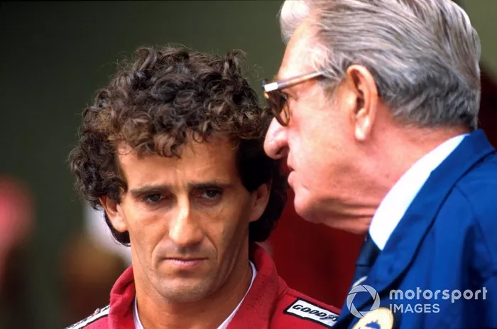Alain Prost, McLaren talking with FISA President Jean-Marie Balestre