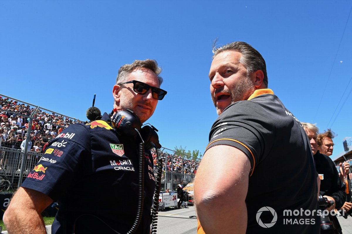 Christian Horner, Team Principal, Red Bull Racing, Zak Brown, CEO, McLaren Racing, on the grid