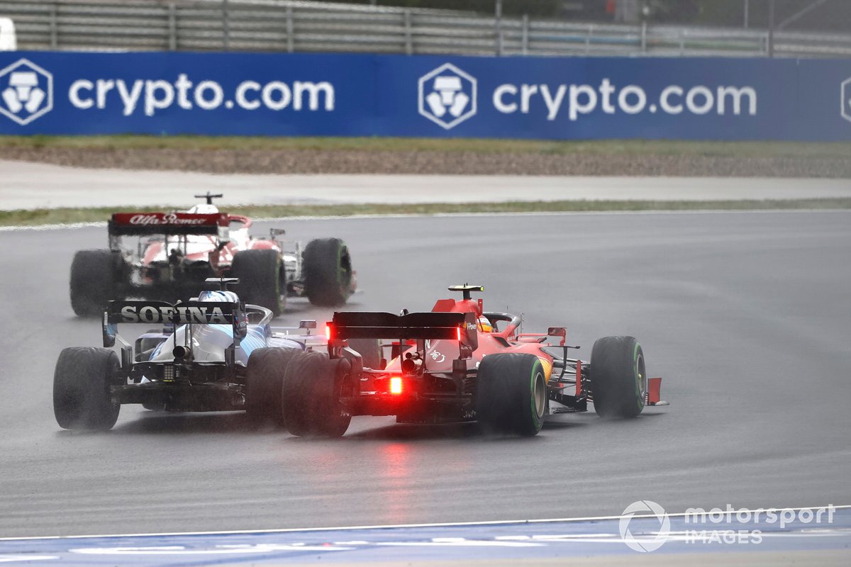 Kimi Raikkonen, Alfa Romeo Racing C41, George Russell, Williams FW43B, and Carlos Sainz Jr., Ferrari SF21