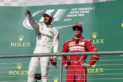 Race winner Lewis Hamilton, Mercedes AMG F1 and third place Kimi Raikkonen, Ferrari celebrate on the podium