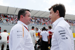 Eric Boullier, Racing Director, McLaren, and Toto Wolff, Executive Director (Business), Mercedes AMG, on the grid