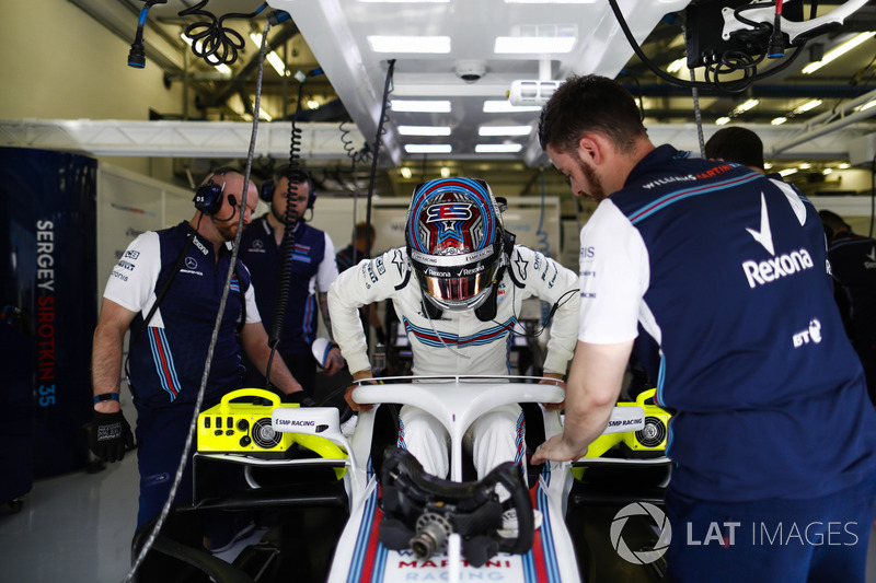 Sergey Sirotkin, Williams Racing, slides into his seat