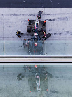 Kevin Magnussen, Haas F1 Team VF-17, is attended to by pit crew