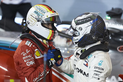 Valtteri Bottas, Mercedes AMG F1, 2nd position, congratulates Sebastian Vettel, Ferrari, 1st position, in Parc Ferme