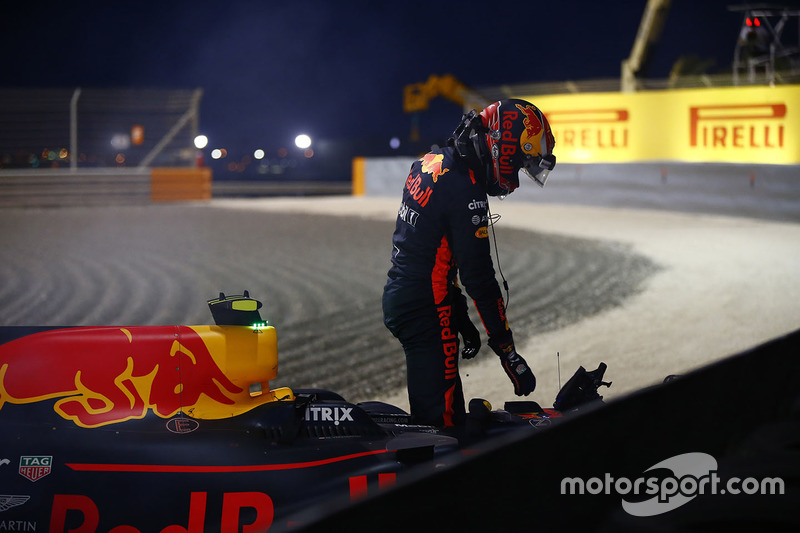 Max Verstappen, Red Bull Racing, climbs out of his car after retiring