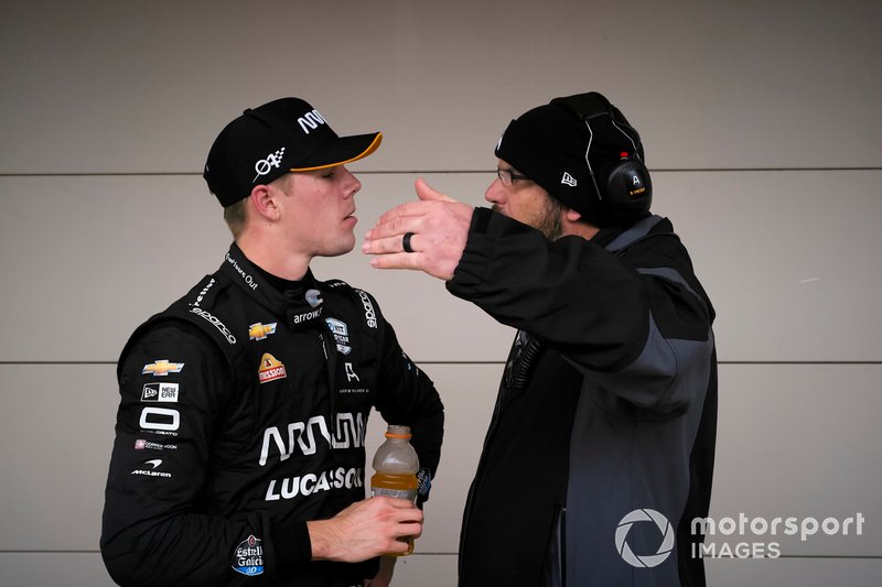 Rookie Oliver Askew listens to competition director Billy Vincent. 