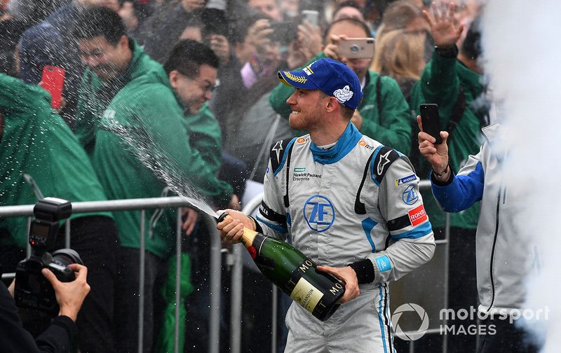 Edoardo Mortara, Venturi Formula E celebrates 2nd position on with his team below the podium