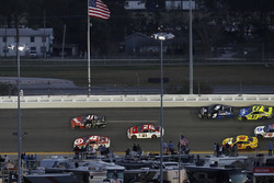 Kurt Busch, Stewart-Haas Racing Ford passes Kyle Larson, Chip Ganassi Racing Chevrolet for the win
