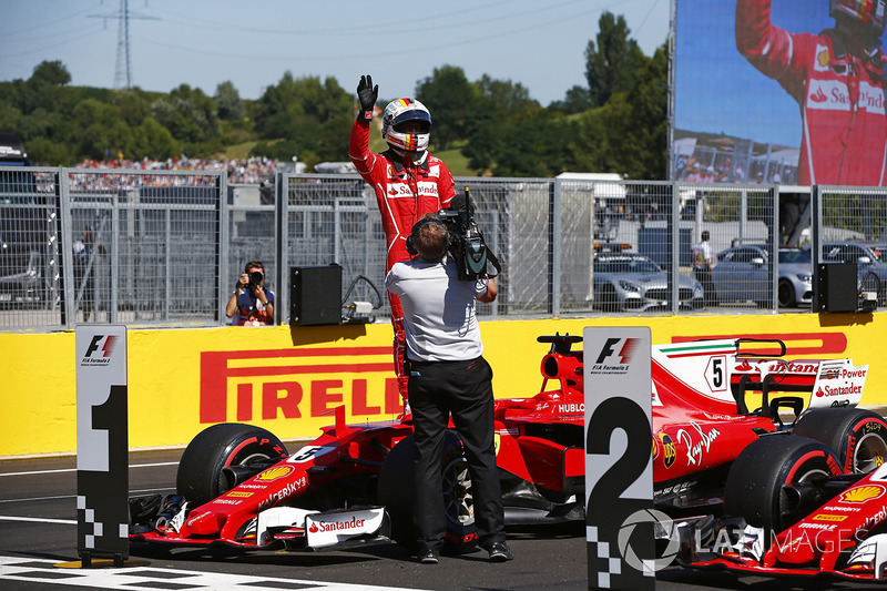 Ganador de la pole Sebastian Vettel, Ferrari