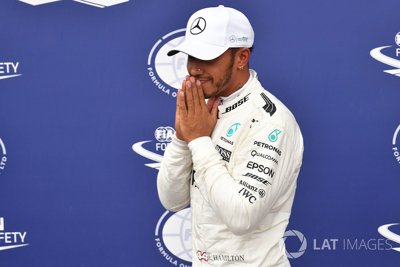 Pole sitter Lewis Hamilton, Mercedes AMG F1 celebrates in parc ferme