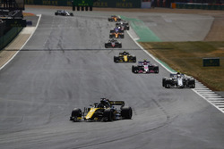 Nico Hulkenberg, Renault Sport F1 Team R.S. 18, leads Charles Leclerc, Sauber C37, and Esteban Ocon, Force India VJM11