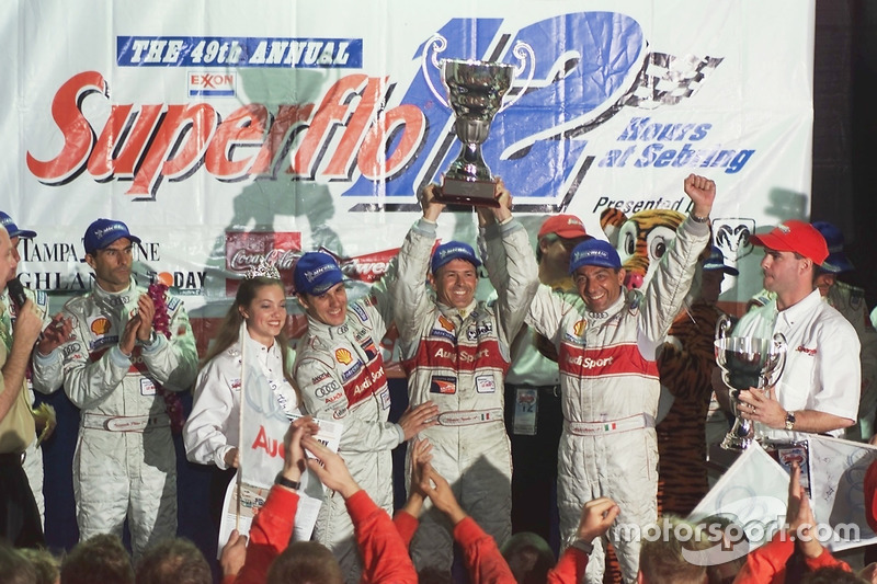 Laurent Aiello, Capello, and Alboreto celebrate victory in the 2001 Sebring 12 Hours. Five weeks later, Michele was gone.