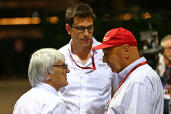(L to R): Bernie Ecclestone, with Toto Wolff, Mercedes AMG F1 Shareholder and Executive Director and