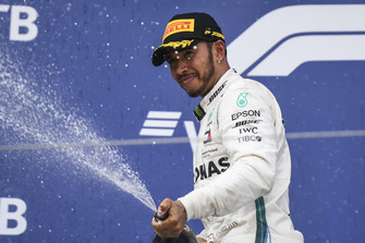 Race winner Lewis Hamilton, Mercedes AMG F1 celebrates with the champagne on the podium